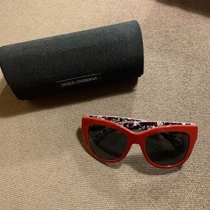 Dolce & Gabbana sunglasses, red frames with dark gray lenses
